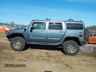 2005 Hummer H2 SUV with VIN 5GRGN23U15H117796, listed as a IAAI auction lot 41543913 with 195,560 mi miles. Bid and sale history available at carsss.com. Image 14.