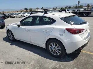 2015 Mazda 3 i Touring with VIN 3MZBM1L74FM178525, listed as a Copart auction lot 57079635 with 88,730 mi miles and Salvage title. Bid and sale history available at DreamBid. Image 2.