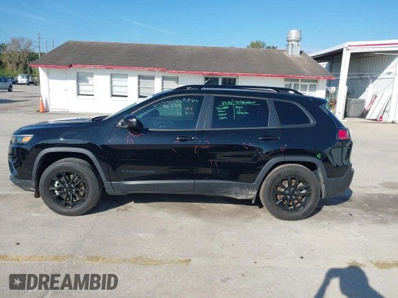 2023 Jeep Cherokee Altitude Lux with VIN 1C4PJMMB9PD100437, listed as a IAAI auction lot 41682945 with 47,428 mi miles. Bid and sale history available at carsss.com. Image 14.