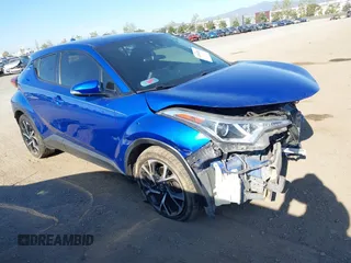 2018 Toyota C-HR XLE z VIN NMTKHMBXXJR007134, wystawiony jako IAAI lot #42004283 z przebiegiem 174 336 mil mil oraz . Historia ofert i sprzedaży dostępna na DreamBid. Obrazek 1.