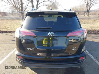 2017 Toyota RAV4 LE z VIN 2T3BFREV6HW543909, wystawiony jako IAAI lot #41668964 z przebiegiem 102 452 mil mil oraz . Historia ofert i sprzedaży dostępna na DreamBid. Obrazek 16.