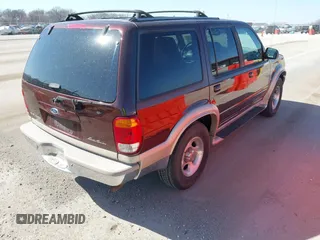 1999 Ford Explorer XLT z VIN 1FMZU35P9XZB88909, wystawiony jako IAAI lot #41759221 z przebiegiem 238 840 mil mil oraz . Historia ofert i sprzedaży dostępna na DreamBid. Obrazek 4.