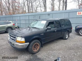 1999 Ford Ranger XL with VIN 1FTYR14V5XPB00021, listed as a IAAI auction lot 41899747 with 180,954 mi miles. Bid and sale history available at carsss.com. Image 2.