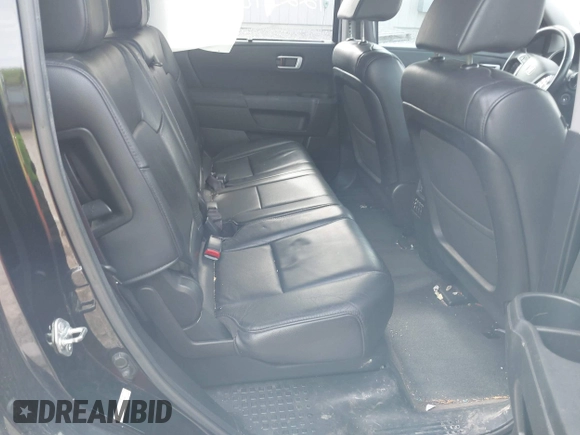 2013 Honda Pilot Touring with VIN 5FNYF3H93DB031630, listed as a IAAI auction lot 42237899 with 198,523 mi miles and . Bid and sale history available at DreamBid. Image 8.