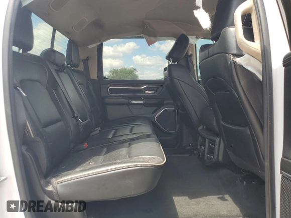 2021 Ram 1500 Laramie z VIN 1C6SRFJTXMN719184, wystawiony jako Copart lot #57024995 z przebiegiem 70 194 mil mil oraz Nie do naprawy • Non repairable. Historia ofert i sprzedaży dostępna na DreamBid. Obrazek 10.