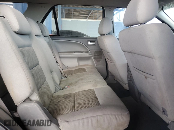 2005 Ford Freestyle SE z VIN 1FMZK04175GA45841, wystawiony jako Copart lot #58373075 z przebiegiem 208 877 mil mil oraz Szkoda całkowita • Salvage title. Historia ofert i sprzedaży dostępna na DreamBid. Obrazek 11.