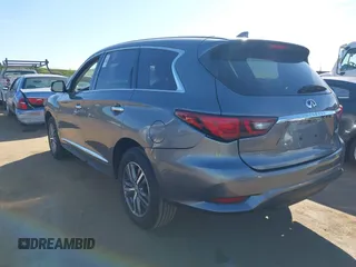 2020 Infiniti QX60 Luxe with VIN 5N1DL0MN5LC520126, listed as a IAAI auction lot 41698233 with 75,249 mi miles and . Bid and sale history available at DreamBid. Image 3.