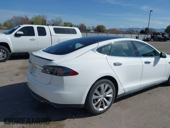 2014 Tesla Model S P85D with VIN 5YJSA1H20EFP63761, listed as a IAAI auction lot 41980472 with 109,164 mi miles and . Bid and sale history available at DreamBid. Image 4.