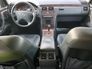 2000 Mercedes-Benz E-Class with VIN WDBJF70J7YB049473, listed as a Copart auction lot 82396624 with 197,515 mi miles and Salvage Title. Bid and sale history available at carsss.com. Image 8.