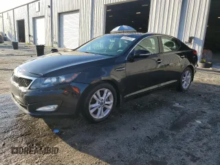 2011 Kia Optima EX z VIN KNAGN4A7XB5176723, wystawiony jako Copart lot #59606225 z przebiegiem 160 257 mil mil oraz Szkoda całkowita • Salvage title. Historia ofert i sprzedaży dostępna na DreamBid. Obrazek 1.