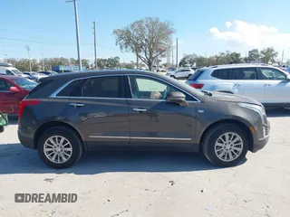 2019 Cadillac XT5 FWD with VIN 1GYKNARS5KZ143510, listed as a IAAI auction lot 41553279 with 53,943 mi miles and . Bid and sale history available at carsss.com. Image 13.