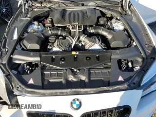 2016 BMW M6 z VIN WBS6E9C59GG437108, wystawiony jako Copart lot #88536225 z przebiegiem 63 891 mil mil oraz Szkoda całkowita • Salvage title. Historia ofert i sprzedaży dostępna na DreamBid. Obrazek 11.