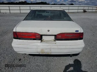 1993 Ford Thunderbird LX z VIN 1FAPP62T6PH189176, wystawiony jako Copart lot #78146094 z przebiegiem 107 514 mil mil oraz Szkoda całkowita • Salvage title. Historia ofert i sprzedaży dostępna na DreamBid. Obrazek 6.