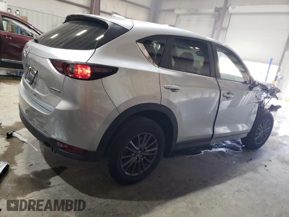 2021 Mazda CX-5 Touring with VIN JM3KFBCM7M0467530, listed as a Copart auction lot 42238385 with 33,277 mi miles and Salvage Title. Bid and sale history available at carsss.com. Image 3.