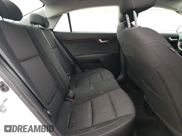 2023 Kia Rio LX with VIN 3KPA24AD0PE566085, listed as a Copart auction lot 50354455 with 65,203 mi miles and Salvage Title. Bid and sale history available at DreamBid. Image 10.
