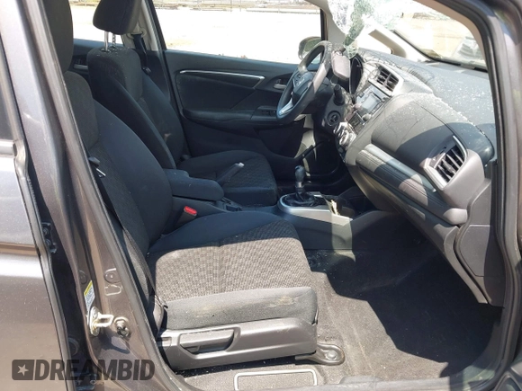 2015 Honda Fit LX with VIN 3HGGK5G57FM747786, listed as a IAAI auction lot 42656703 with 102,637 mi miles and . Bid and sale history available at DreamBid. Image 5.