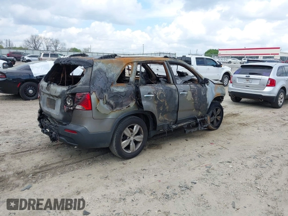 2013 Kia Sorento EX with VIN 5XYKU3A65DG327690, listed as a IAAI auction lot 41968107 with Not provided miles and . Bid and sale history available at DreamBid. Image 4.