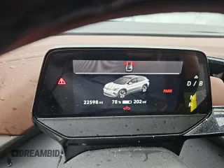2023 Volkswagen ID.4 Pro z VIN 1V2DNPE86PC049852, wystawiony jako Copart lot #53978385 z przebiegiem 22 598 mil mil oraz Szkody całkowita. Historia ofert i sprzedaży dostępna na DreamBid. Obrazek 9.