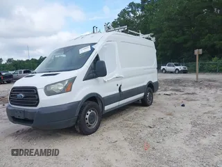 2015 Ford Transit Cargo with VIN 1FTNR1CM7FKA17276, listed as a IAAI auction lot 42506803 with 169,123 mi miles and . Bid and sale history available at DreamBid. Image 2.