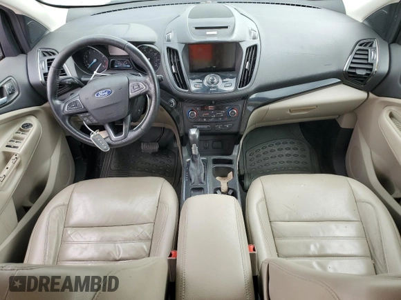 2017 Ford Escape Titanium with VIN 1FMCU0J96HUC12822, listed as a Copart auction lot 54259375 with 127,114 mi miles and Salvage Title. Bid and sale history available at DreamBid. Image 8.