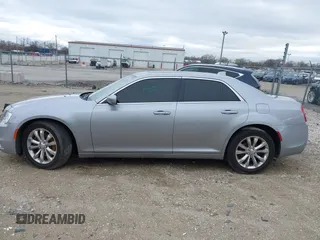 2016 Chrysler 300 Anniversary Edition with VIN 2C3CCARG7GH224788, listed as a IAAI auction lot 41905555 with 232,672 mi miles and . Bid and sale history available at DreamBid. Image 14.