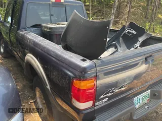 1999 Ford Ranger XL with VIN 1FTZR15V6XTA61496, listed as a Copart auction lot 61017635 with 49,455 mi miles and Clean title. Bid and sale history available at DreamBid. Image 4.