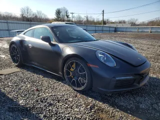2021 Porsche 911 Turbo S with VIN WP0AD2A94MS258095, listed as a Copart auction lot 43157565 with 1,513 mi miles and Salvage Title. Bid and sale history available at DreamBid. Image 4.