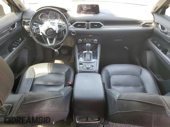 2018 Mazda CX-5 Grand Touring with VIN JM3KFBDM8J0342272, listed as a Copart auction lot 61930115 with 119,727 mi miles and Salvage title. Bid and sale history available at DreamBid. Image 8.