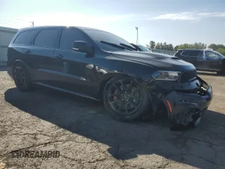 2023 Dodge Durango SRT Hellcat Premium z VIN 1C4SDJH93PC584831, wystawiony jako Copart lot #68612584 z przebiegiem 7 379 mil mil oraz Szkoda całkowita • Salvage title. Historia ofert i sprzedaży dostępna na DreamBid. Obrazek 4.