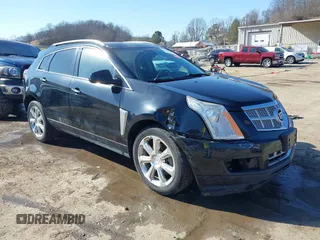 2013 Cadillac SRX Premium Collection with VIN 3GYFNJE34DS542943, listed as a IAAI auction lot 41751654 with 121,874 mi miles and . Bid and sale history available at DreamBid. Image 1.
