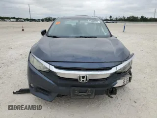 2016 Honda Civic EX-L z VIN 19XFC1F7XGE017790, wystawiony jako Copart lot #53608425 z przebiegiem 119 715 mil mil oraz Szkoda całkowita • Salvage title. Historia ofert i sprzedaży dostępna na DreamBid. Obrazek 5.