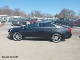 2014 Cadillac XTS Platinum with VIN 2G61W5S84E9127014, listed as a IAAI auction lot 41776334 with 99,879 mi miles. Bid and sale history available at carsss.com. Image 15.
