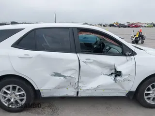 2024 Chevrolet Equinox LS z VIN 3GNAXHEG4RL217496, wystawiony jako IAAI lot #41932850 z przebiegiem 26 583 mil mil oraz . Historia ofert i sprzedaży dostępna na DreamBid. Obrazek 6.