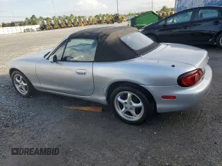 2002 Mazda MX-5 Miata Cloth with VIN JM1NB353420220801, listed as a Copart auction lot 61808645 with 116,451 mi miles and Salvage title. Bid and sale history available at DreamBid. Image 2.