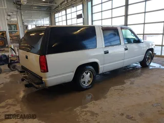 1998 Chevrolet Suburban with VIN 1GNEC16R5WJ358889, listed as a IAAI auction lot 41588573 with 185,298 mi miles. Bid and sale history available at carsss.com. Image 4.
