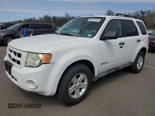 2010 Ford Escape Hybrid z VIN 1FMCU5K35AKC13081, wystawiony jako Copart lot #55447445 z przebiegiem 74 496 mil mil oraz Czysty tytuł • Clean title. Historia ofert i sprzedaży dostępna na DreamBid. Obrazek 1.