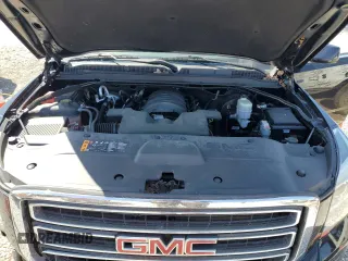 2019 GMC Yukon SLT with VIN 1GKS2BKC0KR337082, listed as a Copart auction lot 51322395 with 96,066 mi miles and Salvage Title. Bid and sale history available at carsss.com. Image 12.