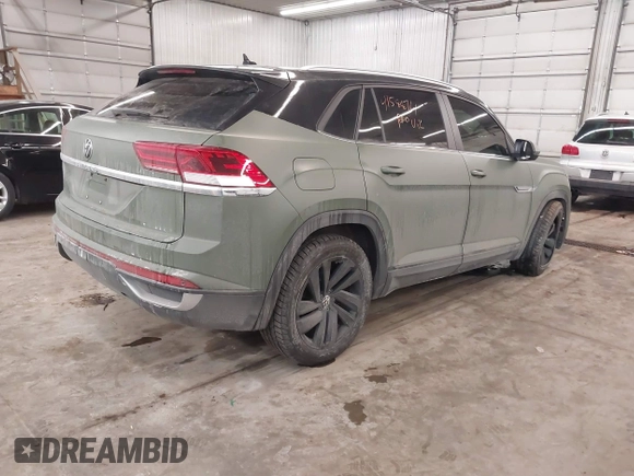 2022 Volkswagen Atlas SE with VIN 1V2KC2CA3NC207745, listed as a IAAI auction lot 41588761 with 99,206 mi miles and . Bid and sale history available at DreamBid. Image 4.