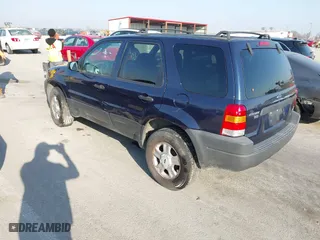 2003 Ford Escape XLT Popular 2 with VIN 1FMYU93103KE17610, listed as a IAAI auction lot 41766806 with 1 mi miles. Bid and sale history available at carsss.com. Image 3.