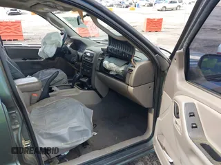 2004 Jeep Grand Cherokee Laredo with VIN 1J4GX48S34C192181, listed as a IAAI auction lot 42320368 with 181,415 mi miles and . Bid and sale history available at DreamBid. Image 5.