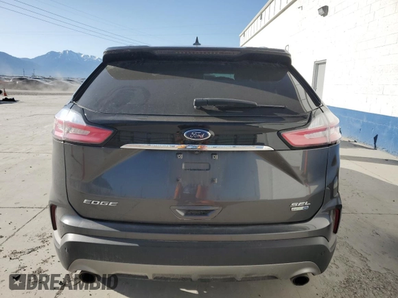 2020 Ford Edge SEL z VIN 2FMPK4J97LBA46310, wystawiony jako Copart lot #56177805 z przebiegiem 97 180 mil mil oraz Szkoda całkowita • Salvage title. Historia ofert i sprzedaży dostępna na DreamBid. Obrazek 6.