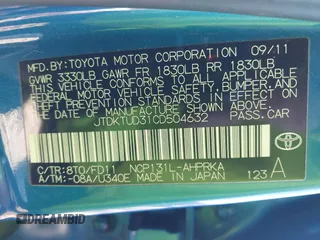 2012 Toyota Yaris L with VIN JTDKTUD31CD504632, listed as a IAAI auction lot 41660676 with 105,789 mi miles. Bid and sale history available at carsss.com. Image 9.