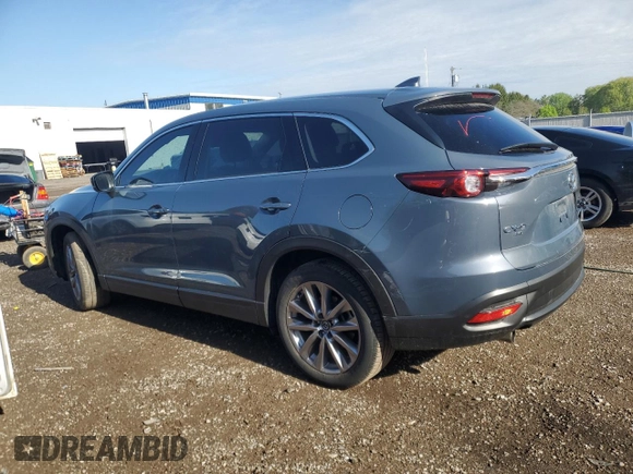 2023 Mazda CX-9 Touring z VIN JM3TCBCYXP0650893, wystawiony jako Copart lot #56875635 z przebiegiem 30 055 mil mil oraz Czysty tytuł • Clean title. Historia ofert i sprzedaży dostępna na DreamBid. Obrazek 2.