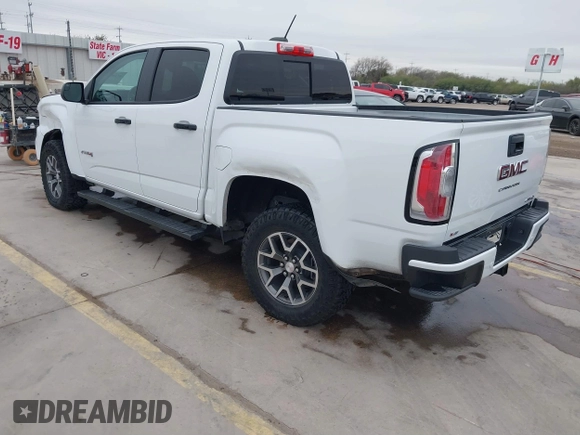 2021 GMC Canyon 4WD AT4 w/Leather with VIN 1GTG6FEN6M1154040, listed as a IAAI auction lot 41209527 with 29,484 mi miles. Bid and sale history available at carsss.com. Image 3.