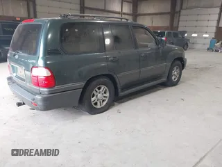 1998 Lexus LX 470 with VIN JT6HT00W3W0001352, listed as a IAAI auction lot 41882901 with 226,917 mi miles and . Bid and sale history available at DreamBid. Image 4.