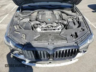 2022 BMW 5 Series M550i xDrive z VIN WBA13BK0XNCJ23778, wystawiony jako Copart lot #76946634 z przebiegiem 24 889 mil mil oraz Szkoda całkowita • Salvage title. Historia ofert i sprzedaży dostępna na DreamBid. Obrazek 11.