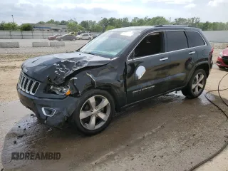 2015 Jeep Grand Cherokee Overland z VIN 1C4RJFCG6FC787849, wystawiony jako Copart lot #57234355 z przebiegiem 141 271 mil mil oraz Nie do naprawy • Non repairable. Historia ofert i sprzedaży dostępna na DreamBid. Obrazek 1.