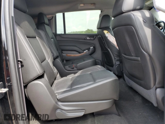 2015 Chevrolet Suburban LTZ with VIN 1GNSKKKC1FR624679, listed as a Copart auction lot 52957365 with 71,194 mi miles and Salvage Title. Bid and sale history available at DreamBid. Image 11.