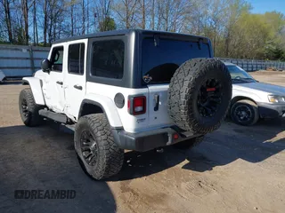 2019 Jeep Wrangler Unlimited Sahara with VIN 1C4HJXEN2KW591557, listed as a IAAI auction lot 41962034 with 88,691 mi miles and . Bid and sale history available at DreamBid. Image 3.