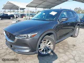 2021 Mazda CX-5 Grand Touring with VIN JM3KFADM9M1382742, listed as a IAAI auction lot 41449421 with NaN miles. Bid and sale history available at carsss.com. Image 17.